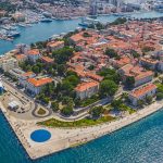 Aerial shot of Zadar old town, famous tourist attraction called greeting the sun, Croatia.